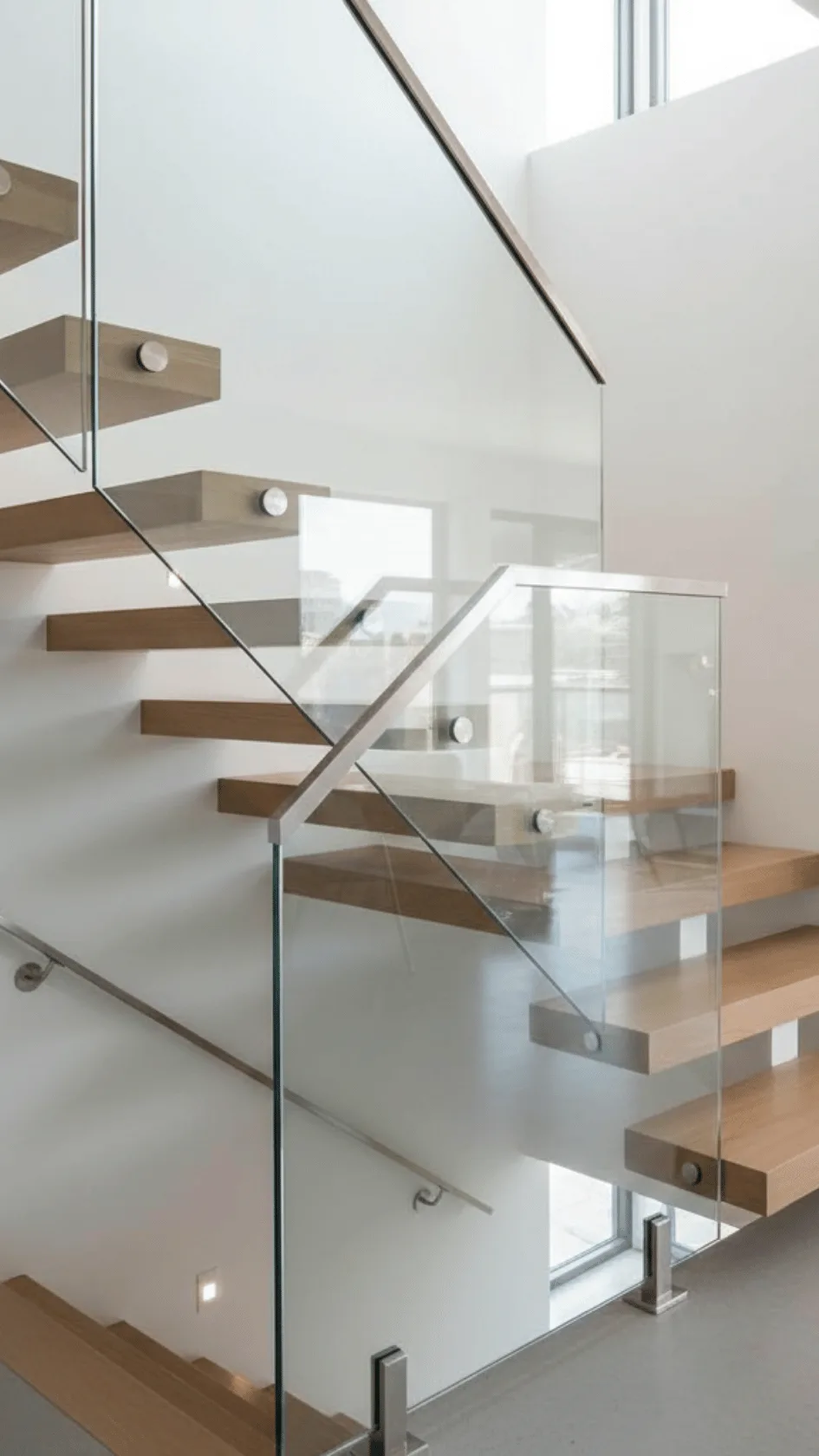 Custom glass railing on staircase in a modern home by Glass and Shower Doors Custom glass railing on staircase in a modern home by Glass and Shower Doors